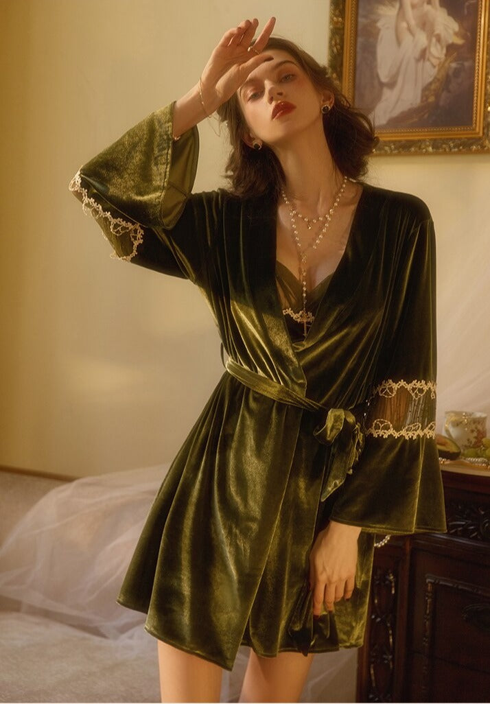 Elegant green velvet robe with lace details, model wearing layered necklaces and striking a pose, ideal for loungewear or nightwear.