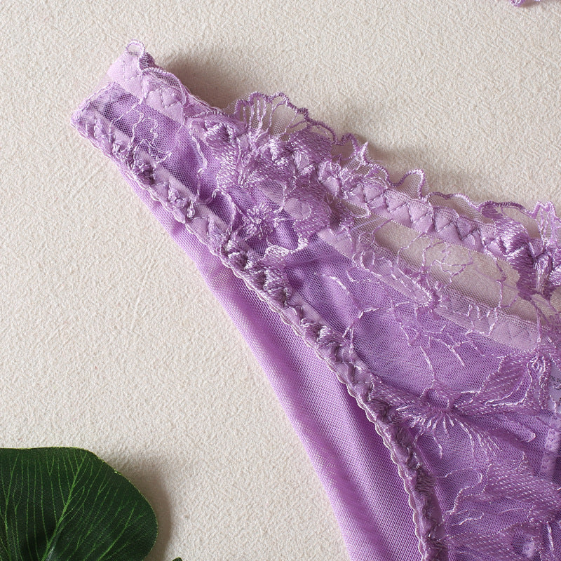 Lavender lace lingerie thong with intricate floral embroidery, showcasing delicate detailing and soft fabric, perfect for enhancing feminine elegance and comfort. Ideal for stylish confidence and