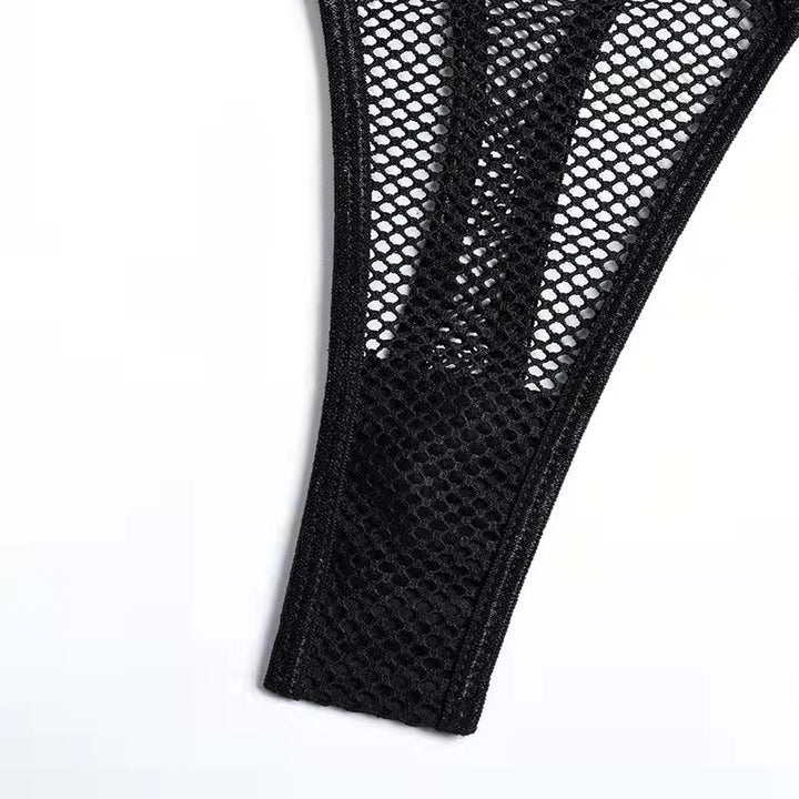 Black lace mesh thong with intricate detailing, perfect for sensual lingerie sets.