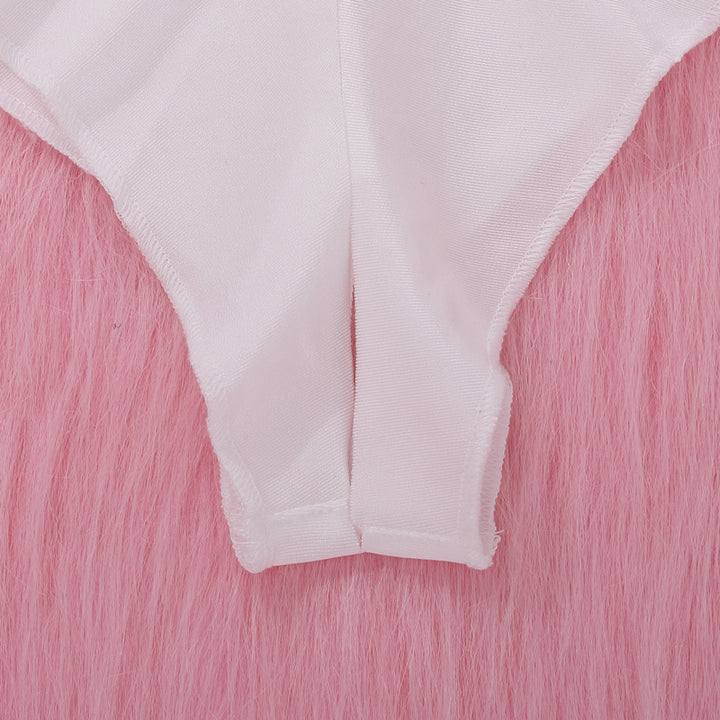 White lace thong lingerie on a pink fur background.