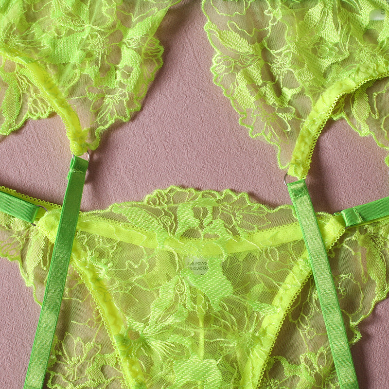 Neon green lace lingerie set with floral patterns and delicate straps, showcasing a sexy and elegant design.