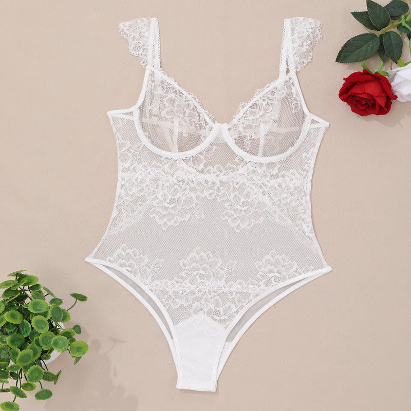 White lace bodysuit with floral detailing and delicate straps, perfect for intimate occasions.