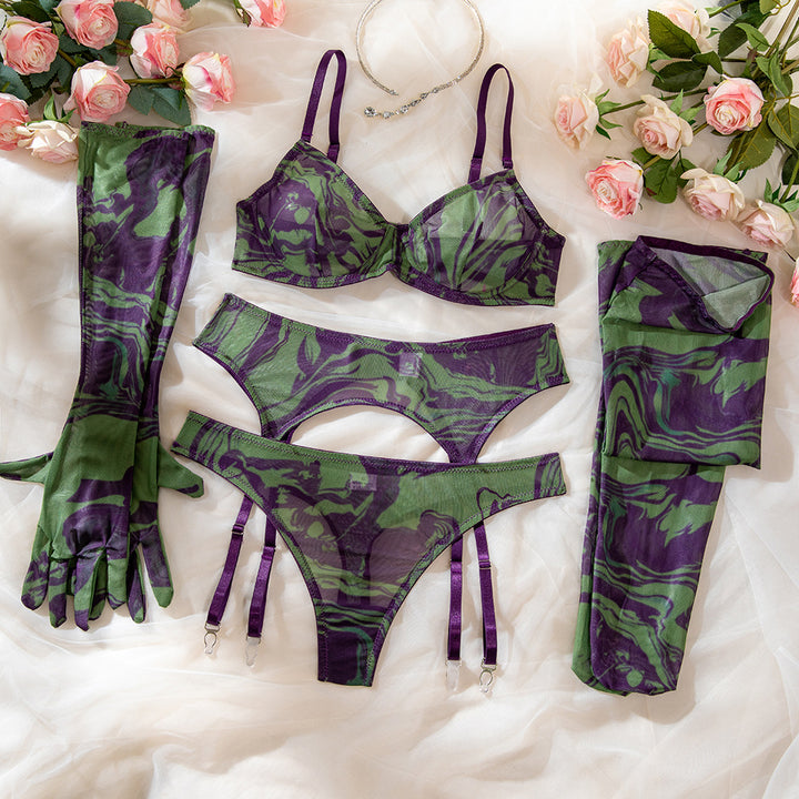 Lingerie set featuring a stylish green and purple marbled bra, matching panties with cut-out design and garter straps, elegant long gloves, and