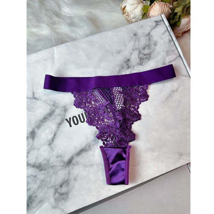 Elegant purple lace thong featuring intricate floral design on a soft satin base, perfect for adding a touch of luxury to your lingerie collection. Ideal for special occasions