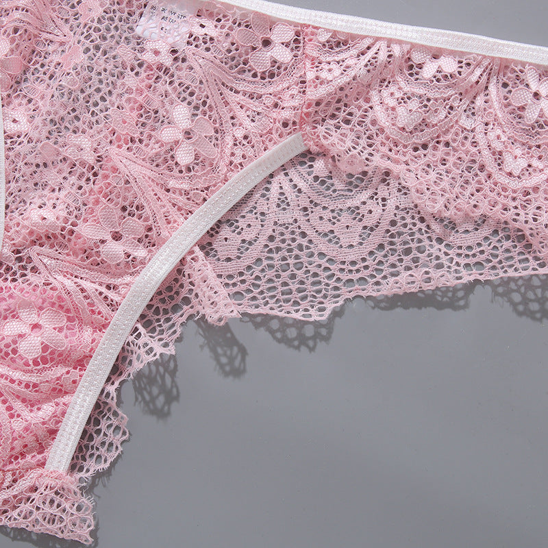 Delicate pink lace lingerie featuring floral designs and a comfortable waistband.