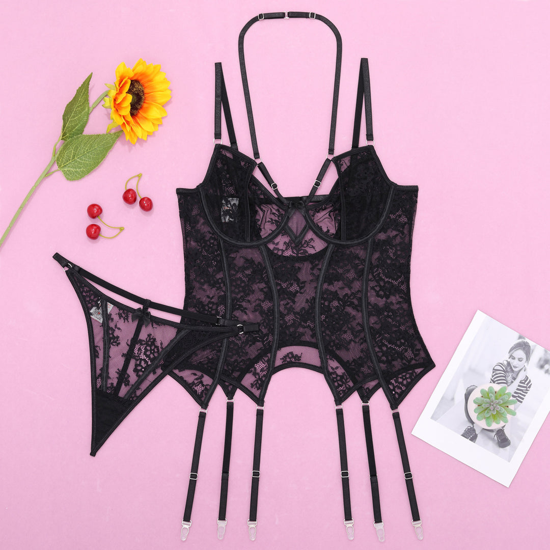 Black lace lingerie set featuring a corset with intricate detailing, adjustable straps, and matching thong. The set includes garter straps for added elegance, beautifully