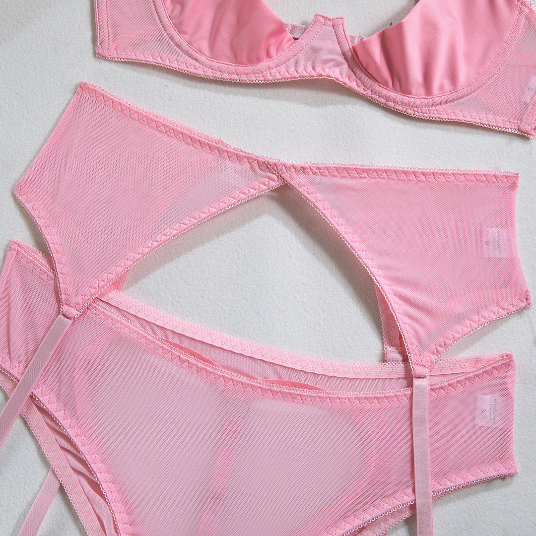 Pink lingerie set featuring a delicate sheer bra and matching high-waisted panties, designed for comfort and elegance. The fabric has a soft, lightweight texture,