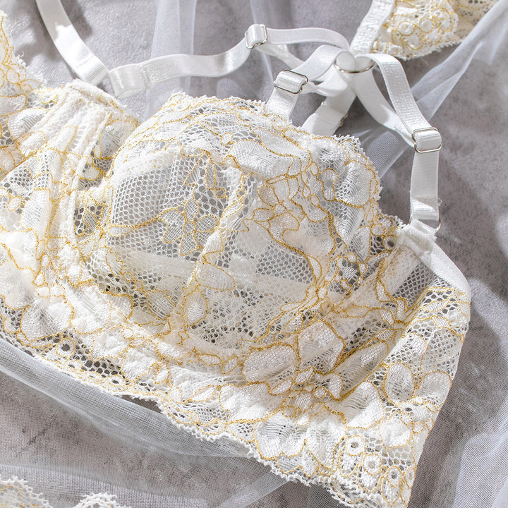 delicate lace bralette featuring intricate gold thread detailing and adjustable satin straps, perfect for adding a touch of elegance to your lingerie collection, showcasing a combination