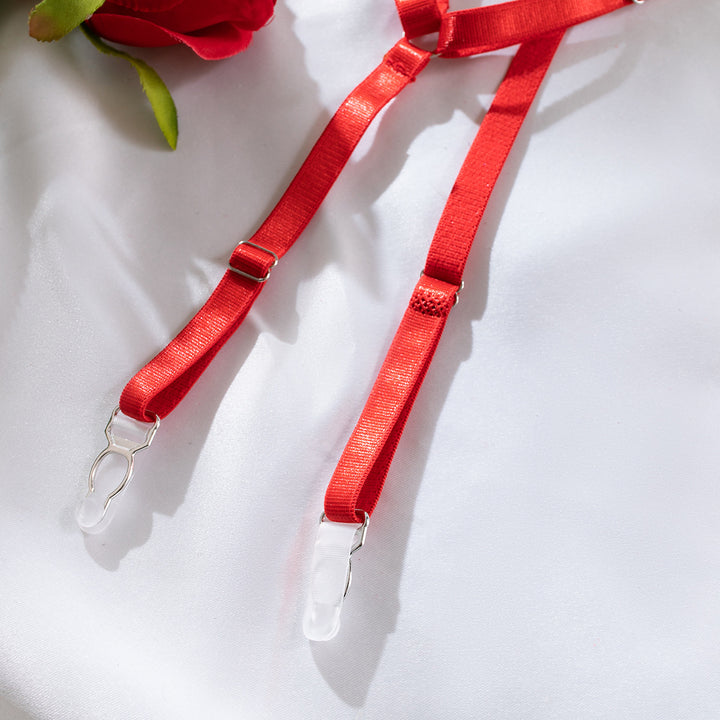 Red adjustable straps with clear clips on a soft fabric background, designed for lingerie and nightwear.