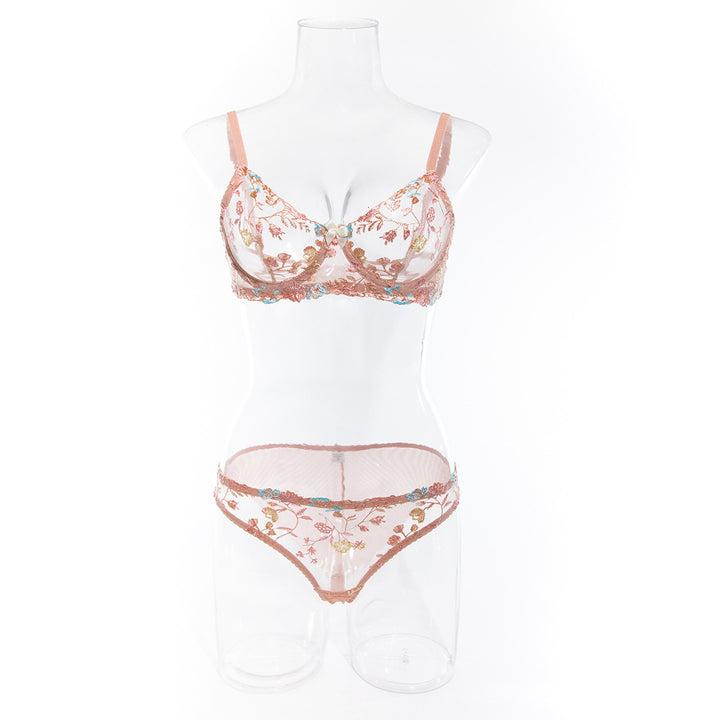 Lace bralette and matching brief set featuring floral embroidery in shades of pink, gold, and blue, perfect for a romantic nightwear look.