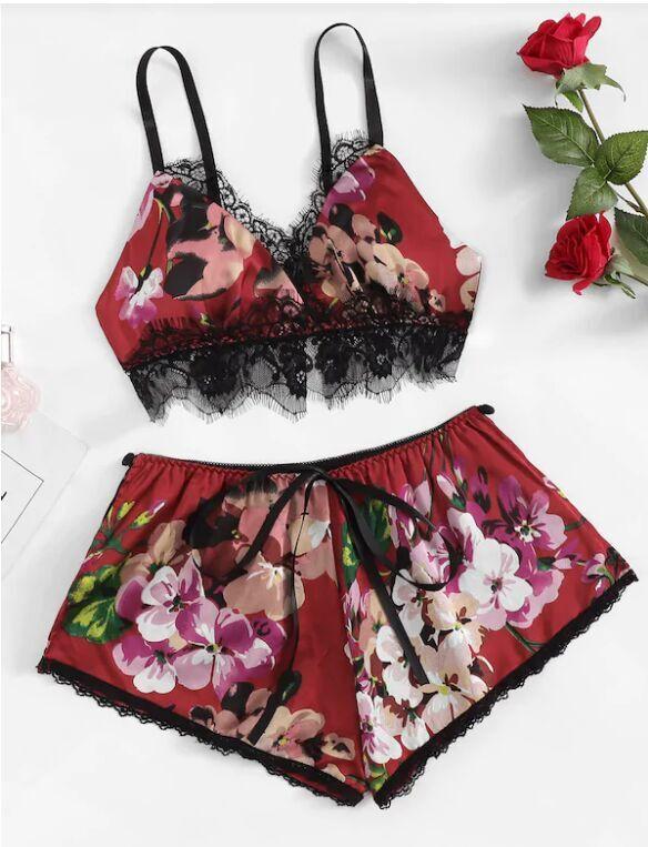 Floral lace-trimmed bralette and shorts set in rich red with assorted flower print, perfect for comfortable and stylish loungewear.