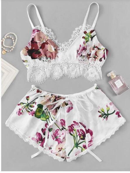 Floral lace bralette and matching shorts set in white, featuring vibrant flower prints and delicate lace trim, perfect for elegant sleepwear.