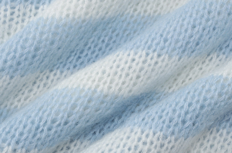 Soft knit fabric in light blue and white stripes, perfect for cozy loungewear.