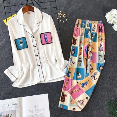 Women's pajama set featuring a white button-up top with contrast pockets and colorful patterned bottoms showcasing various playful designs.