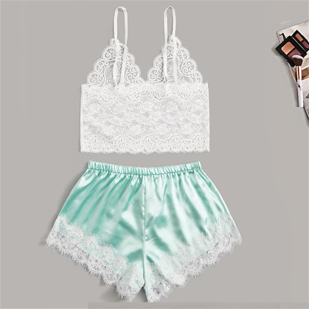 White lace crop top paired with silky mint green shorts featuring a lace trim, perfect for lingerie and nightwear collection.