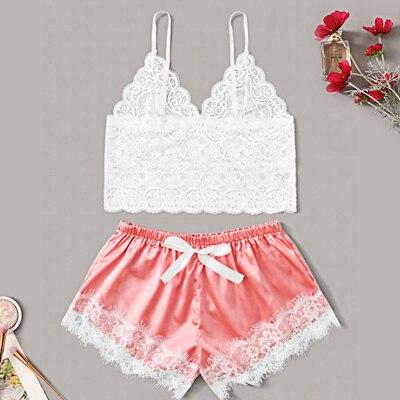 Lace bralette and satin lace-trimmed shorts set in white and pink, perfect for lingerie and nightwear collections.