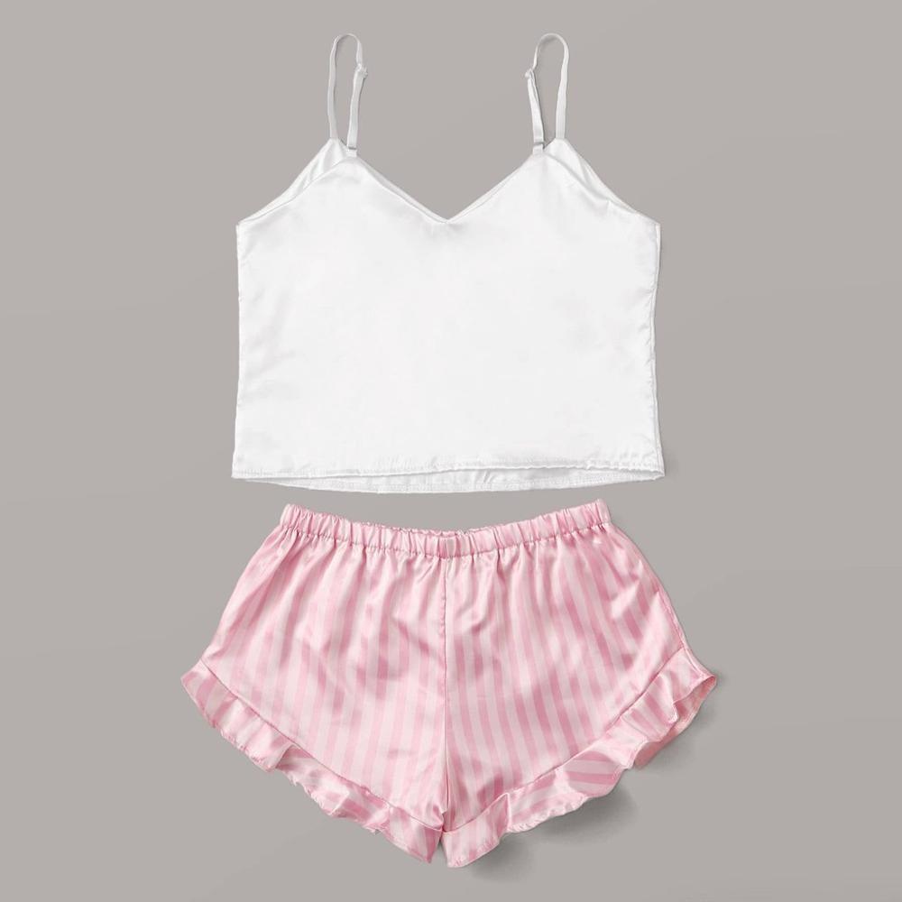 White satin camisole top with adjustable straps paired with pink striped satin shorts featuring a frilled hem. Ideal for a comfortable and stylish sleepwear set.