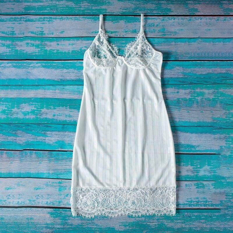 Lace-trimmed white silk nightgown with adjustable straps and vertical stripes, perfect for elegant sleepwear.